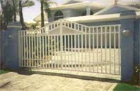 Sliding gate with pitched centre