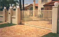 Sliding gate with matching pedestrian gate and  fence infills